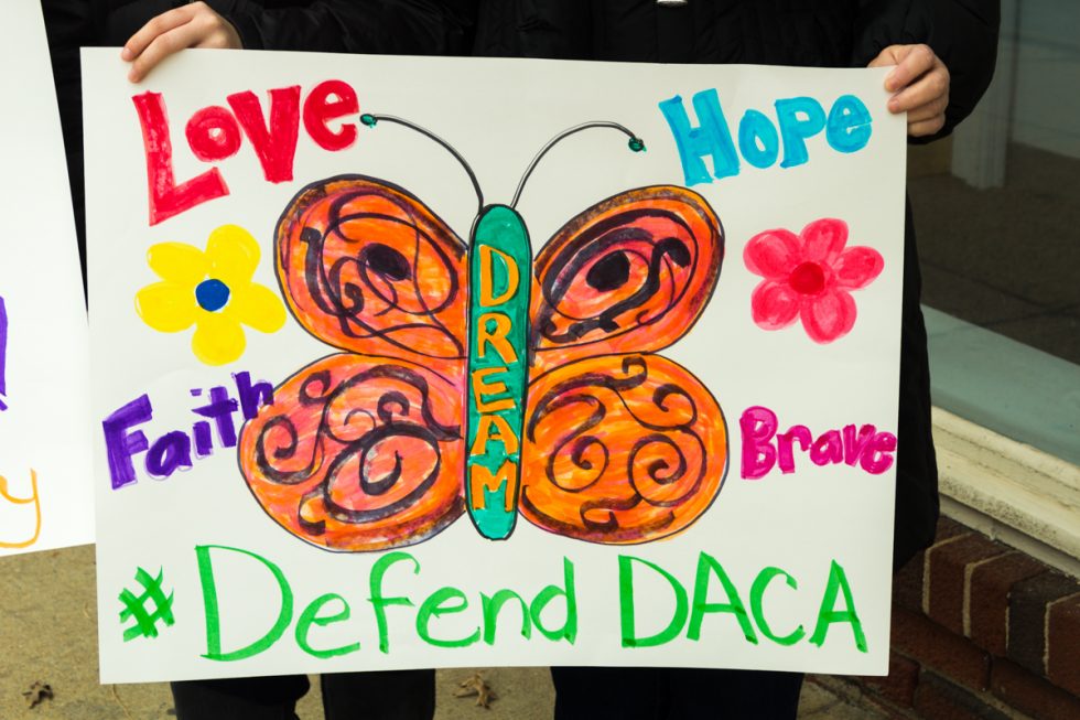 Colorful sign Defend DACA