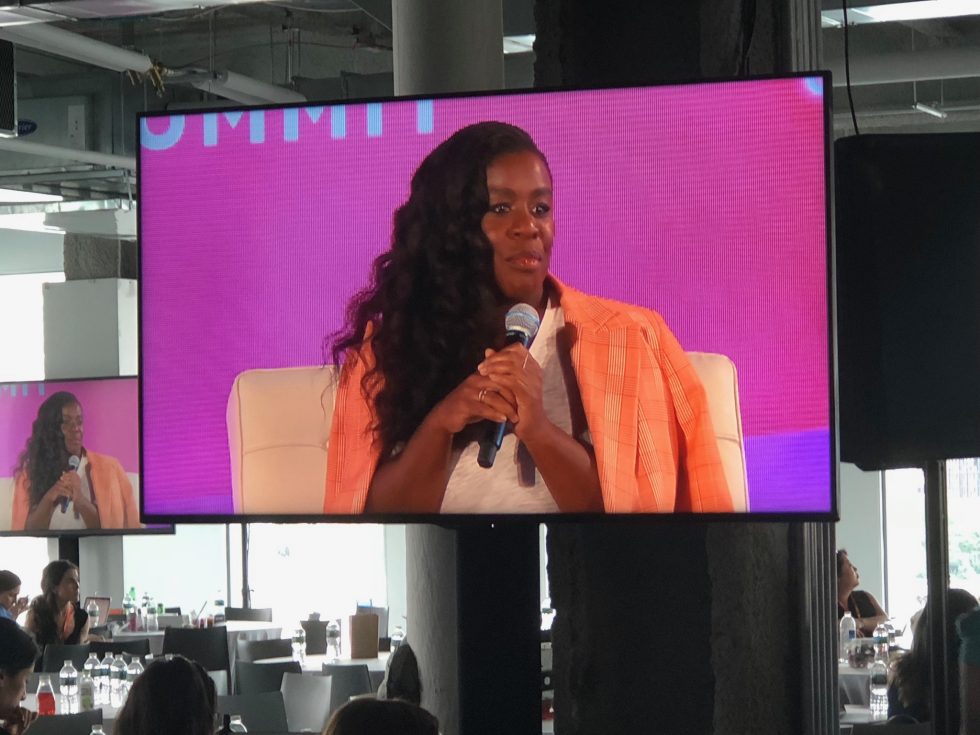 Uzo Aduba speaking at conference Blogher18